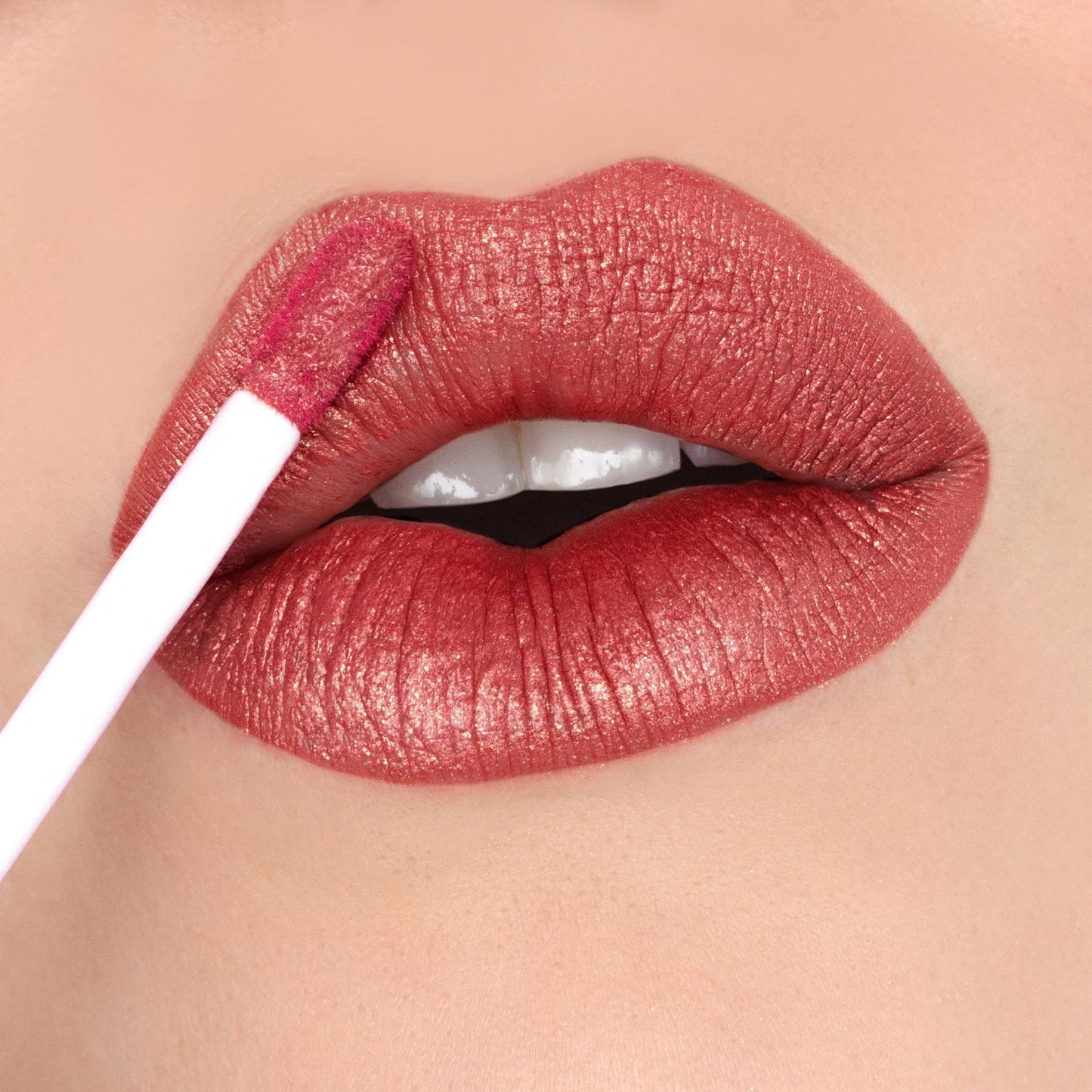 Day Rate | A Soft Earthy Red With Gold Shimmer Liquid Lipstick