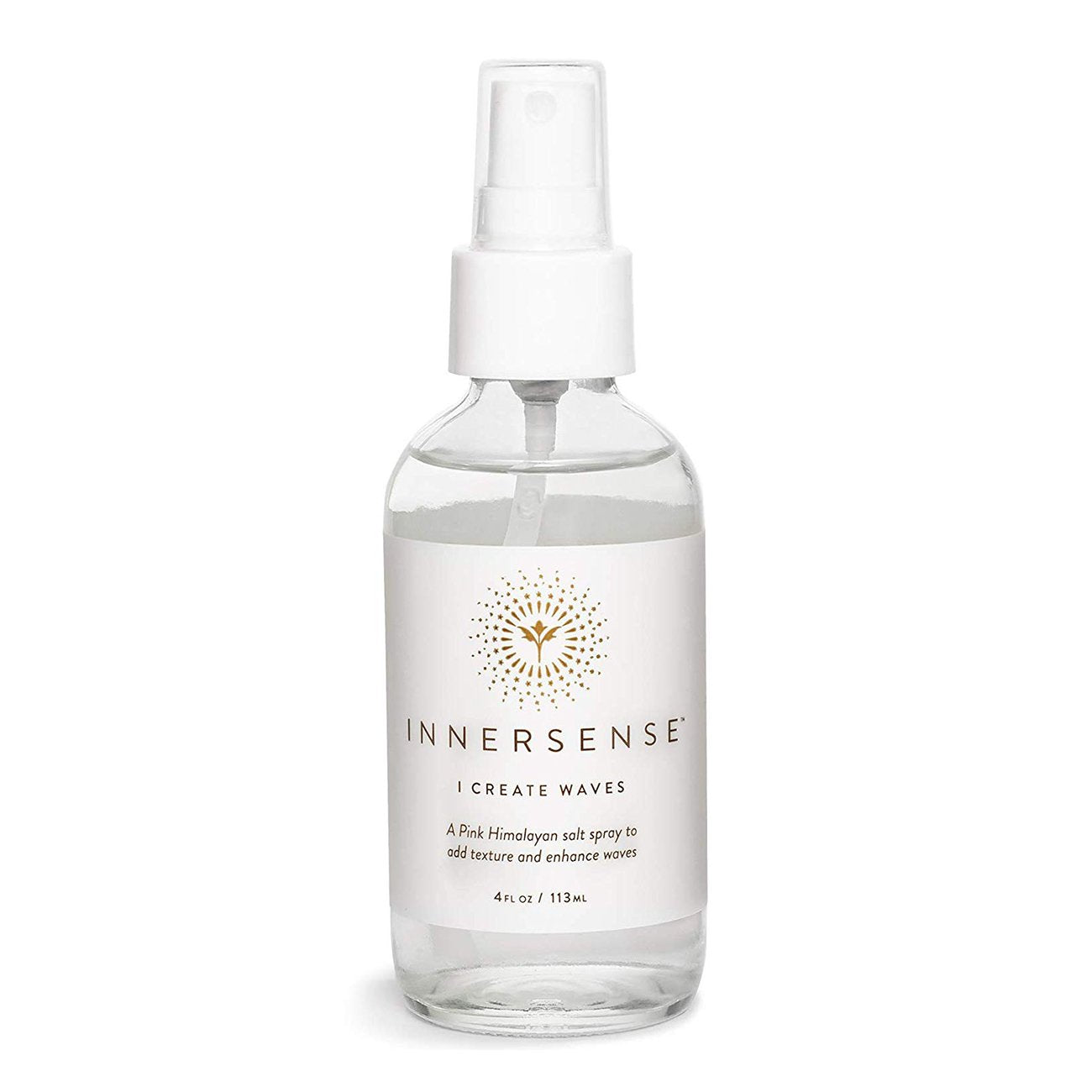 A bottle of innersense "i create waves" salt spray for hair.