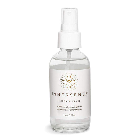 A bottle of innersense "i create waves" salt spray for hair.
